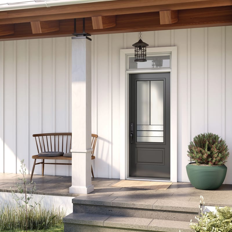 A dark grey entry door with a glass insert and a transom above it